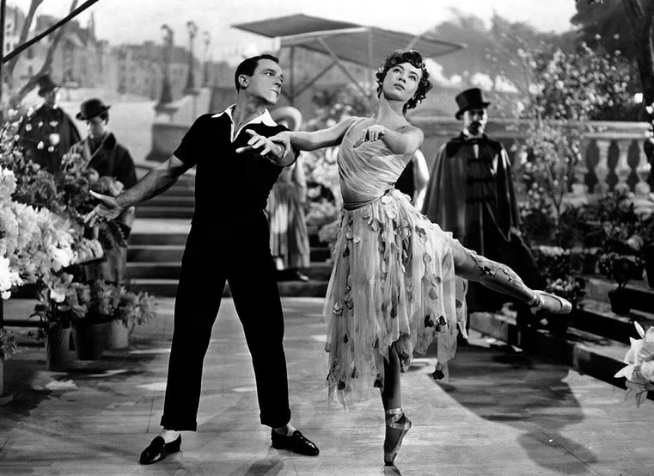 Gene Kelly and Leslie Caron in An American in Paris MGM_Courtesy Neal Peters Collection.png